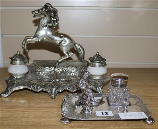 Two silver plated ink stands, one of a horse and the other an angel